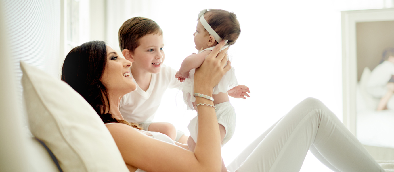 mom-baby-child.jpg A mother with newborn and younger child