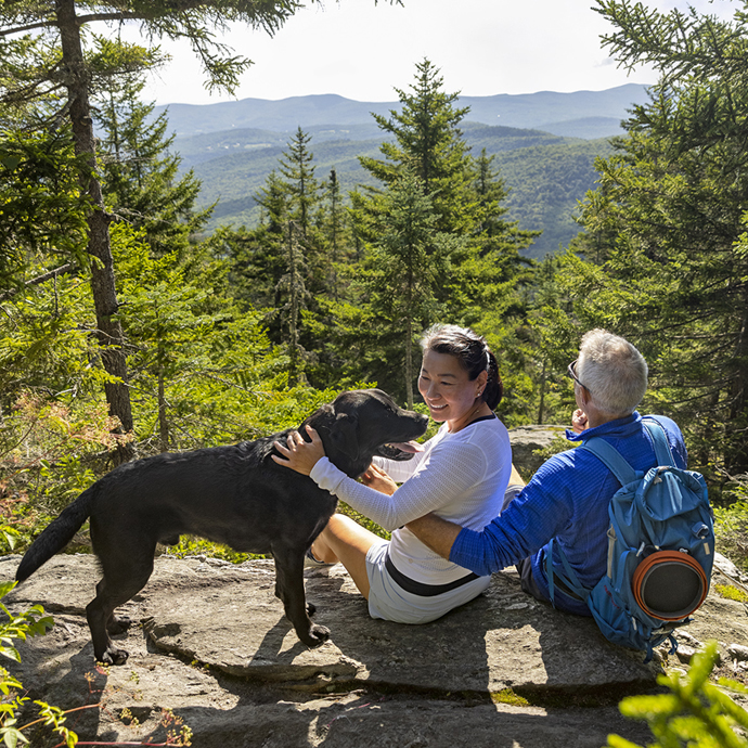 Couple on top of mountain with dog.jpg couple on top of a mountain in Vermont