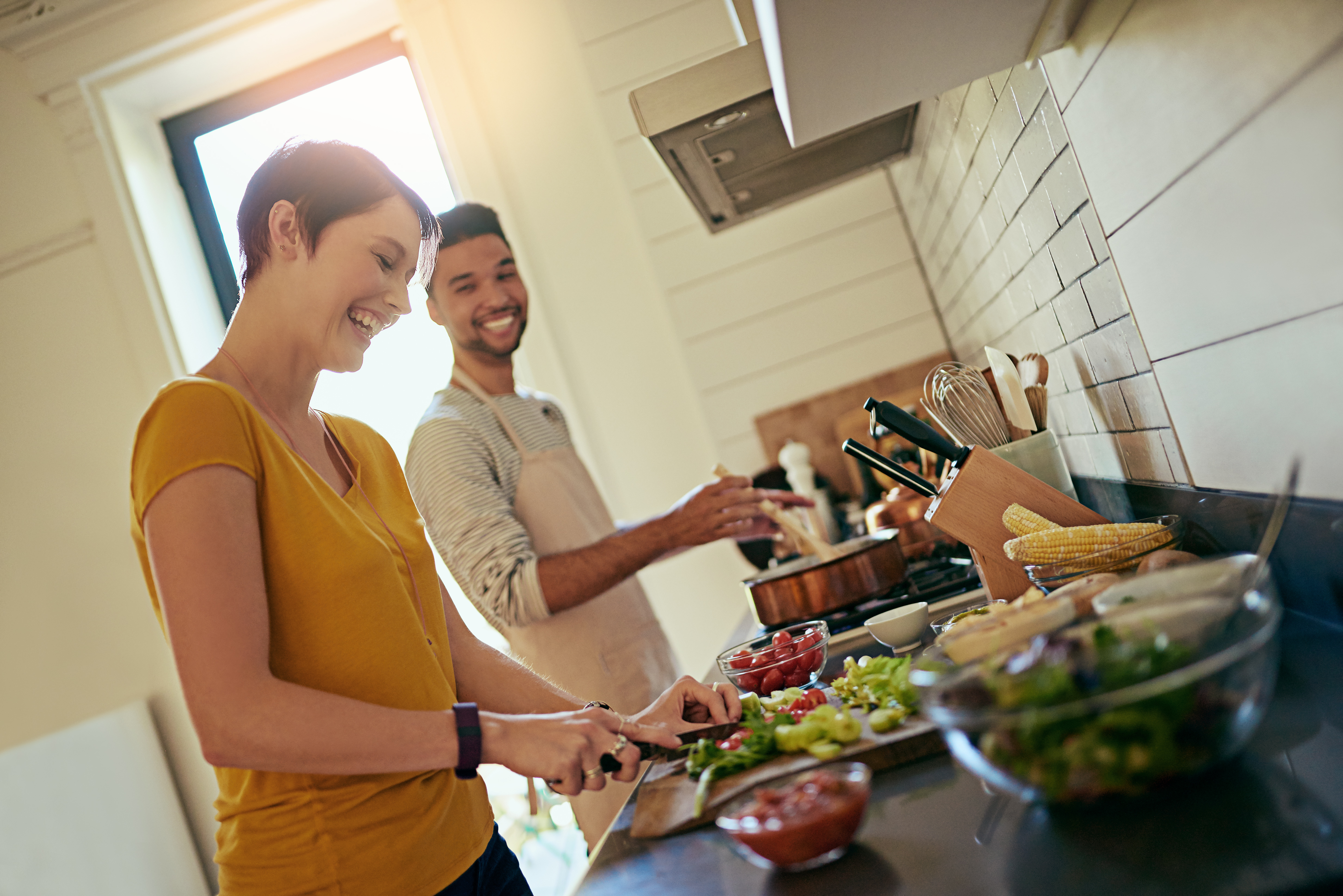 iStock-639000268.jpg Couple cooking healthy meal