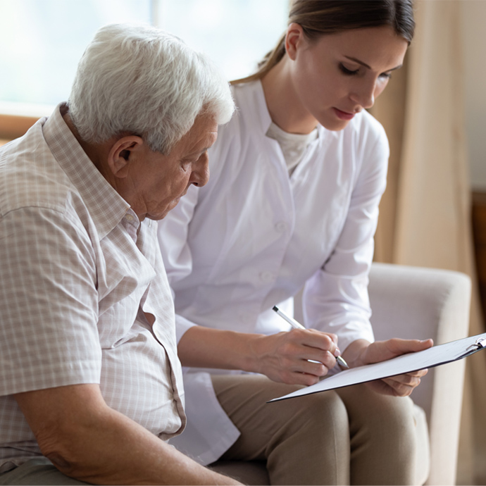 a patient reviewing information with a provider