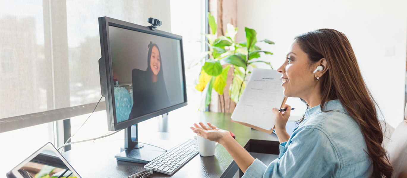 Woman on a telehealth call on her computer