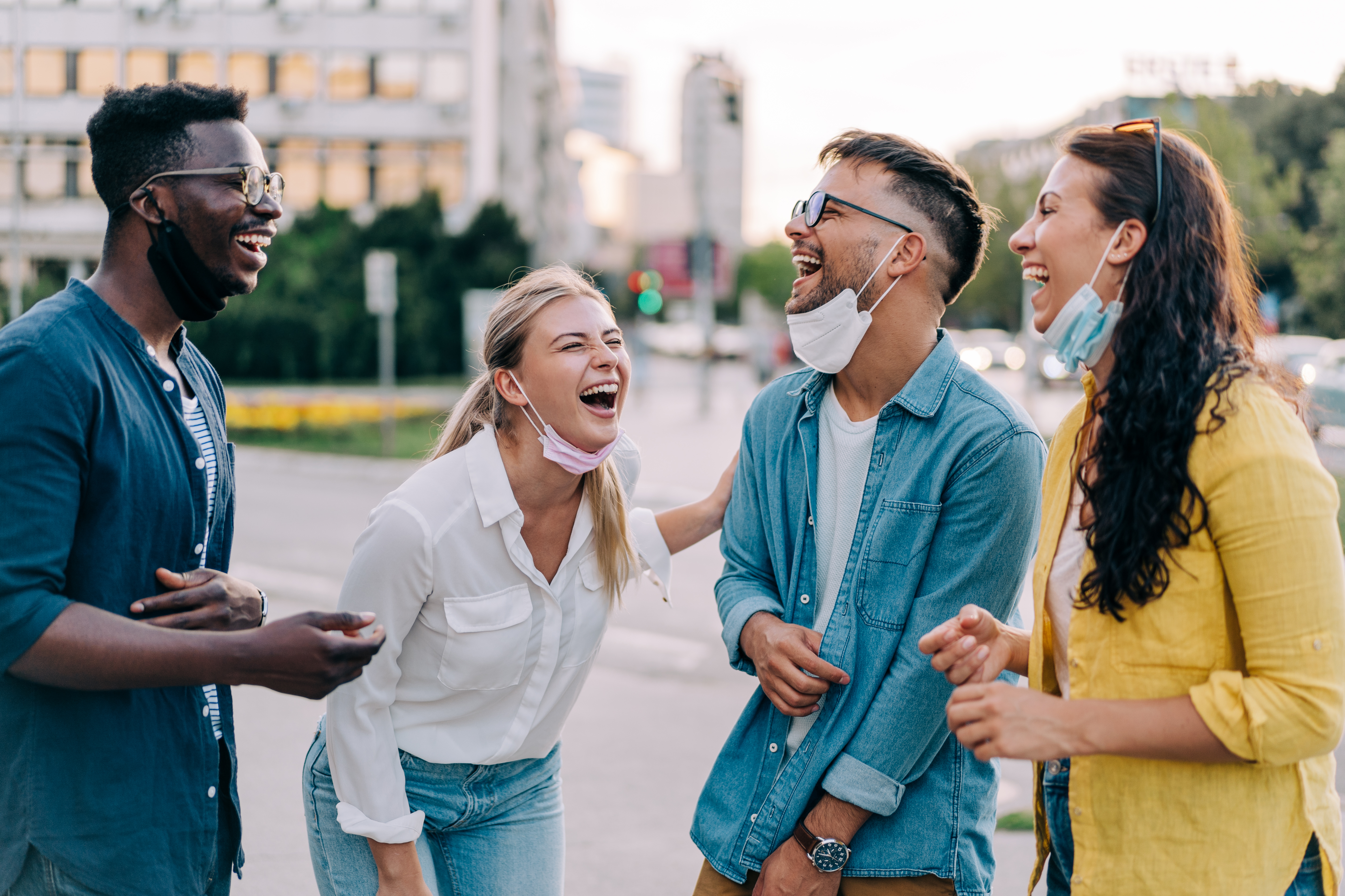FriendsLaughing.jpg Friends having fun outdoors in the city