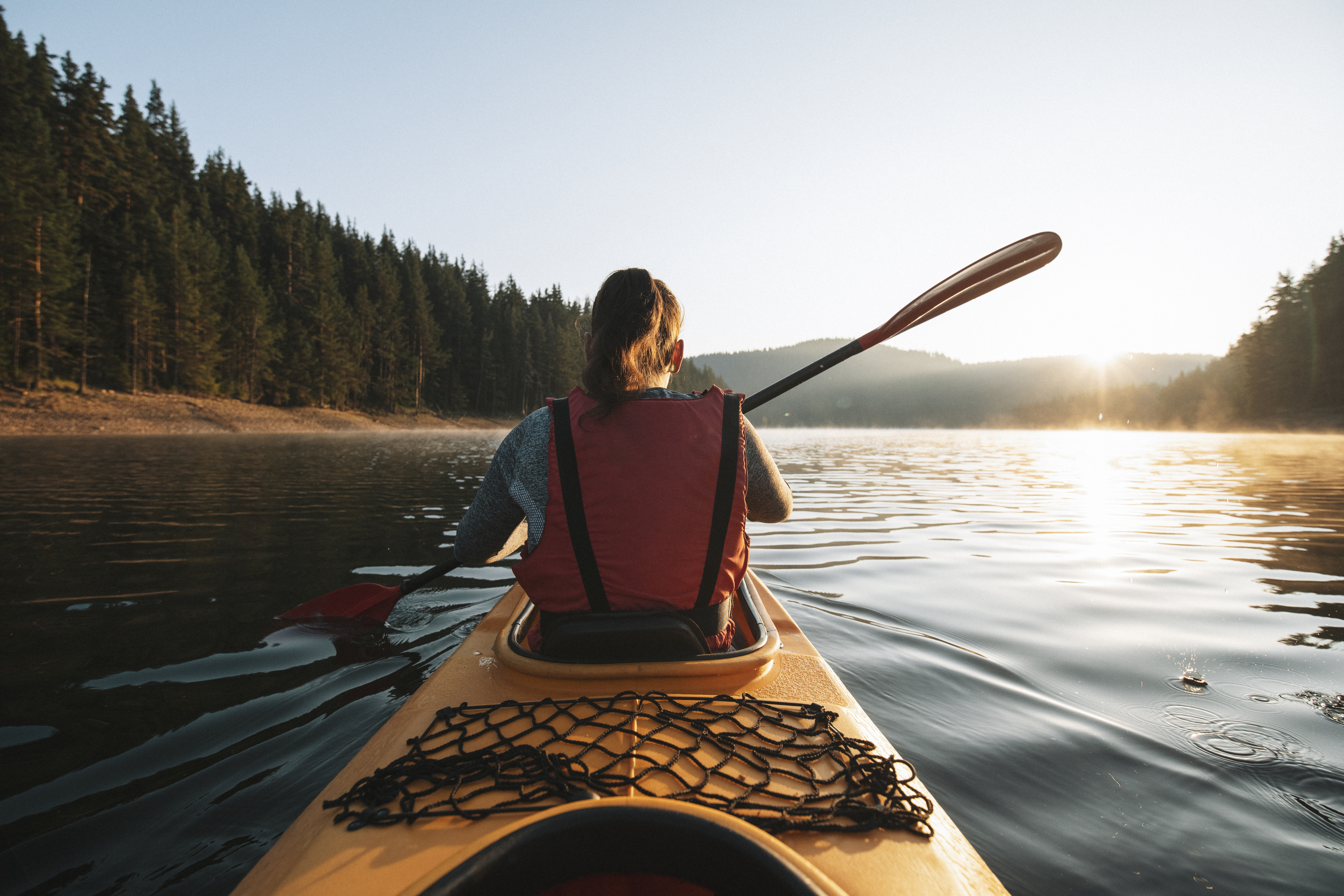 Happiness in kayaking.jpg Woman Kayaking