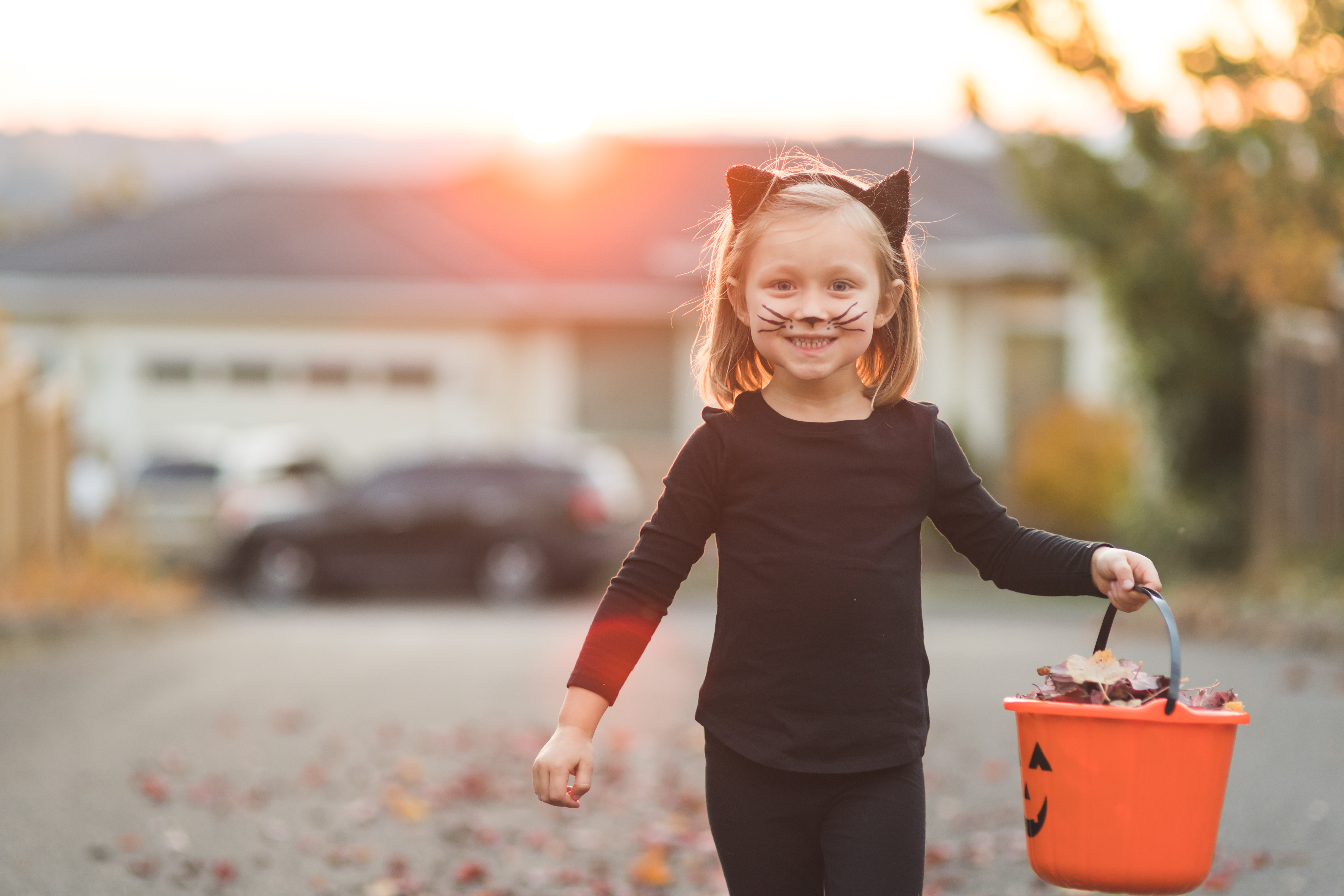 Family activity girl trick or treating halloween