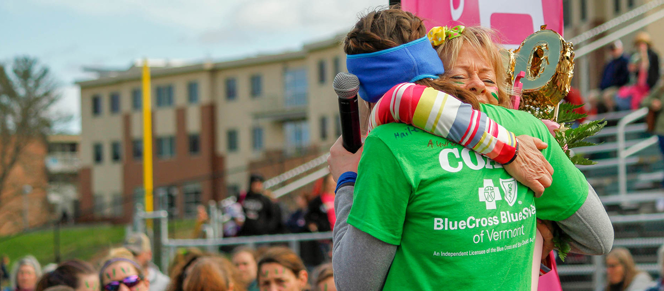 GOTRVT Leaders embracing at a 5K event