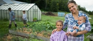 Family working on a farm