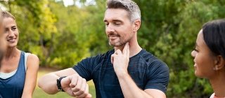 Man checking his pulse during exercise