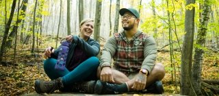 A male and female hiking Vermont trails