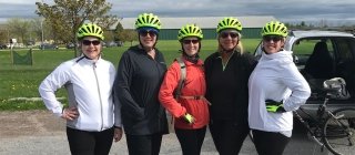 Group of women cycling during Wellness Revolution program
