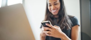 Woman using her cell phone