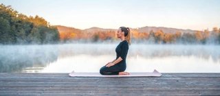 Woman doing yoga outside for wellness