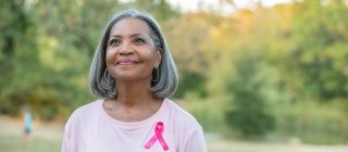 breast cancer survivor smiling