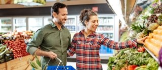 couple grocery shopping for plant-based diet