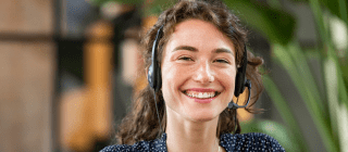 customer service rep smiling at camera