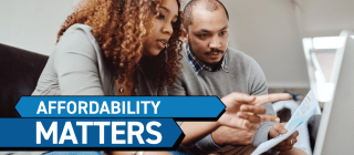 Couple looking at medical bills