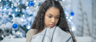 girl looking sad during the holidays 