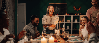 group of friends sharing a holiday meal