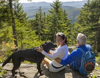 couple on top of a mountain in Vermont