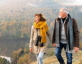 Man and woman walking on a mountian
