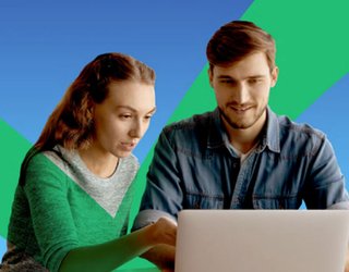 Couple looking at healthcare bill on computer
