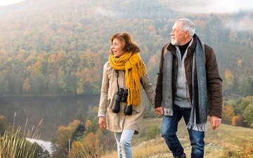 Man and woman walking on a mountian