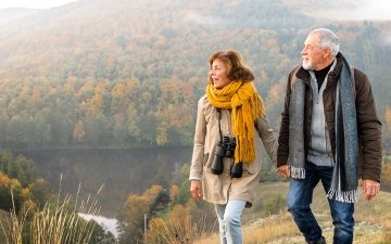 Man and woman walking on a mountian