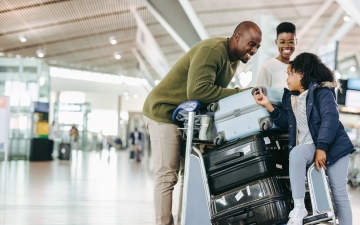 Family traveling through an airport