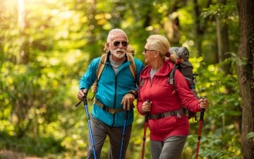 Couple walking in the woods