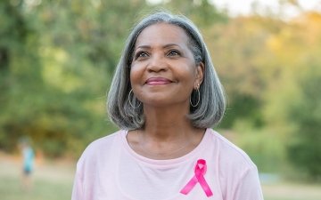 breast cancer survivor smiling