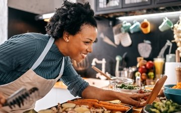 Woman following vegan recipe
