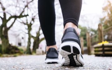 Wellness, person going for a walk