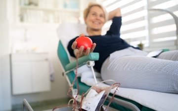 Happy woman is laying down while