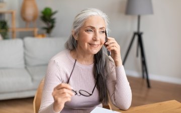 Senior woman calling customer service case management phone
