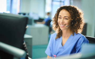 Nurse case manager answering phones in office setting