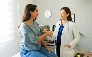 patient shaking hands with her new doctor