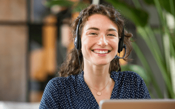 customer service rep smiling at camera