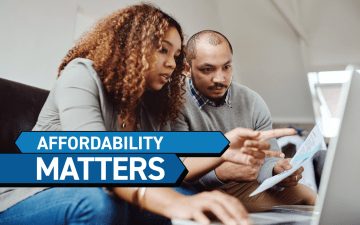 Couple looking at medical bills