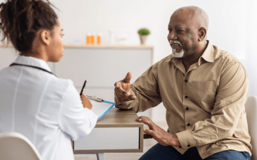 man speaking with his doctor