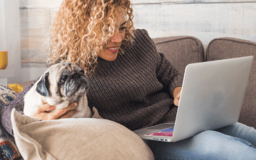 woman looking at her computer