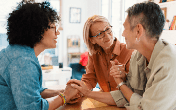 three women having a deep conversation