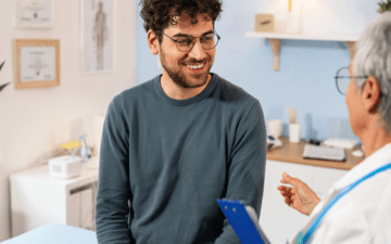 young man in 20s at his annual wellness exam