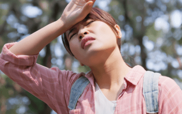 woman overheating while hiking