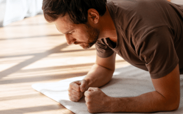 man doing plank at home
