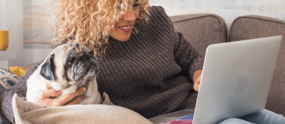 woman looking at her computer