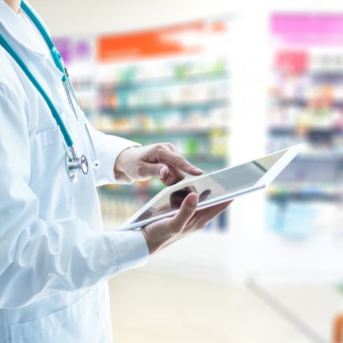 Pharmacist on tablet Pharmacist on tablet