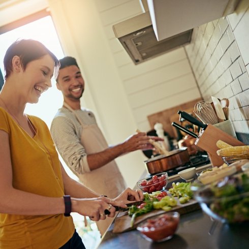 iStock-639000268.jpg Couple cooking healthy meal