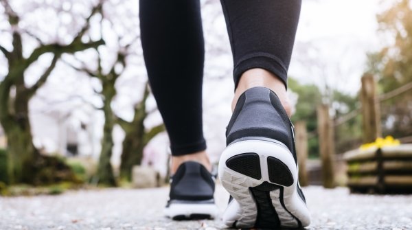 Wellness, person going for a walk