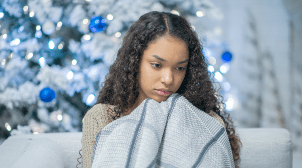 girl looking sad during the holidays