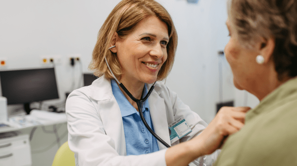 Doctor listening to a patient's chest with a stethescope