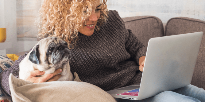 woman looking at her computer